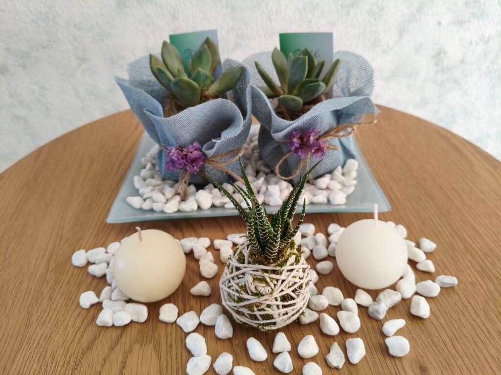 kokedama wedding favours on a table
