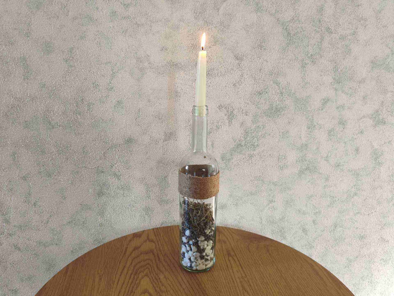 DIY wine bottle candle holder